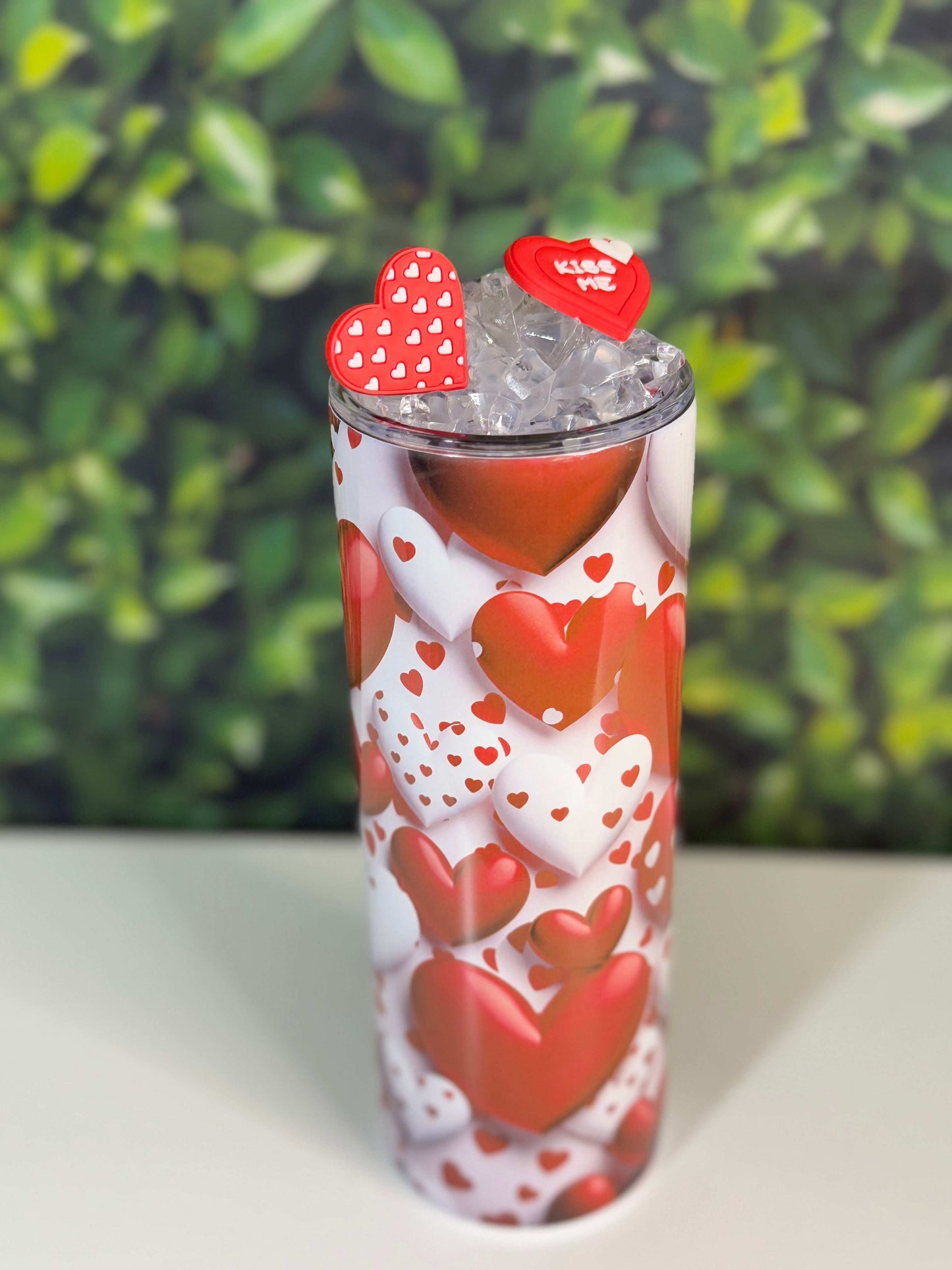 Red and White Hearts on a 20oz stainless steel Tumbler with artificial ice topping